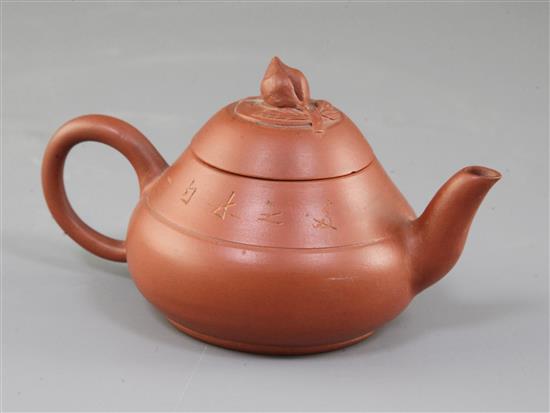 A Chinese Yixing pottery conical teapot and cover, 19th century, spout to handle 11.5cm